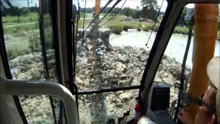 Long Reach Excavator Loading Mud