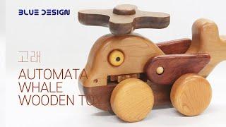 Making an automata wooden toy whale operates using the power of wheels and gears.