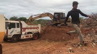 Machine Excavator stuck in deep mud Dump Truck Unloading Soil Pushing Dirt work 025