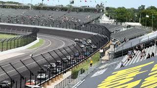 First lap of 2024 NASCAR Xfinity race at Indianapolis Motor Speedway with huge crash from grandstand