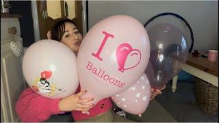 Blowing up pink themed balloons to match my pink bow 