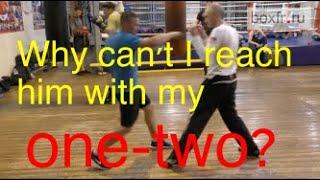 Boxing: why can't I reach him with my one-two?