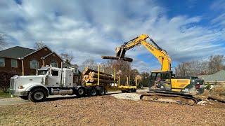 Loading logs and pushing mulch