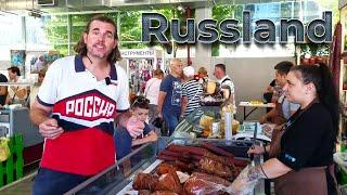 Ein Amerikaner probiert Lebensmittel im sanktionierten Russland auf dem Bauernmarkt/ @EXPAT AMERICAN