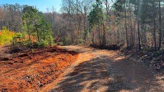 Driveway was destroyed in rainstorm. Adding new drainage & water control.  Steep hill gravel drive