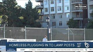 New video: residents stealing electricity from San Diego lamp posts