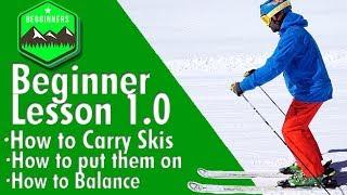 BEGINNER SKI LESSON 1.0 - how to carry skis, put skis on, balance on skis