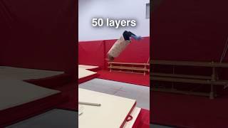 How many layers of wrapping paper can stop a backflip? #gymnast #gymnastics