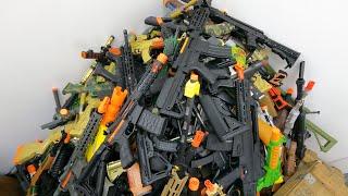 Here's a First! Airsoft Heavy Machine Guns, Mountain of a Giant Toy Gun, Or Gun Tray of a Gun