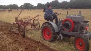 Kramer k18 20 horse power tractor pulling 4 furrow plough