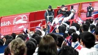 Girl laughing at amusing North Koreans in the Asian Football Cup!