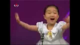 Small cute North Korean girl singing - very lovely voice & expressions