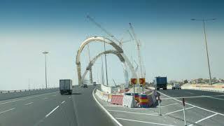 Driving through arches in Doha, Qatar, 2017-10-14