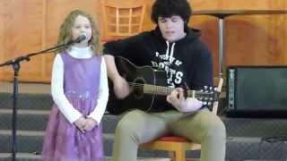 Brother and Sister at the Music Festival