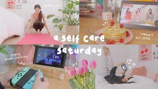 a self-care saturday skincare, working out, comfort food, cozy gaming