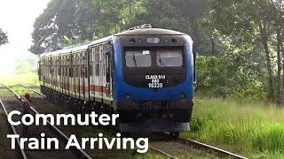 Commuter Train Arriving at Batuwatta Railway Station in Sri Lanka