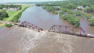 Iowa floodwaters breach levees as even more rain forecast for drenched Midwest