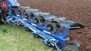 New Holland PM4975S plough at work with T6.180 tractor.