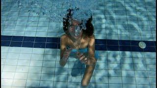 Carla Underwater Blowing Bubbles underwater