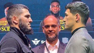 Artur Beterbiev terminator stare down of Dmitry Bivol in TENSE rematch face off!