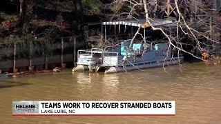 Teams work to recover stranded boats from Lake Lure, NC