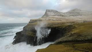 Strong winds messing up in Gásadalur, Faroe Islands