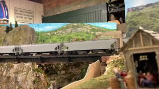 HO Scale Seaboard System Freight train on the upper level.