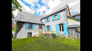 Two lovely and cosy interlinking houses with a barn and a garden with lovely views in La Porcherie.