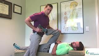 Dr. Corey and Dr. Adam demonstrate how to do a piriformis stretch with assistance