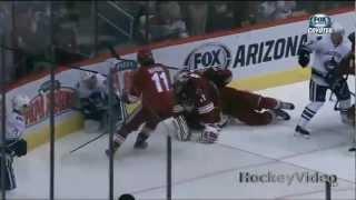 Alex Edler charging major on Mike Smith . Mar 21, 2013