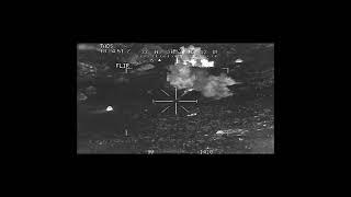 AH-64 Apache in action - main chain gun and hellfire missile strikes