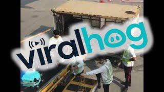 Hong Kong Airport Employees Toss Luggage Carelessly || ViralHog