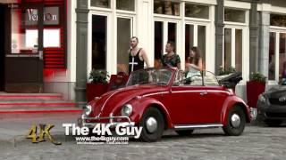 4K UHD 60fps - People walk around old vintage red car parked in old city street