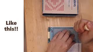 A Brother card punch set to create custom punchcards for your knitting machine.