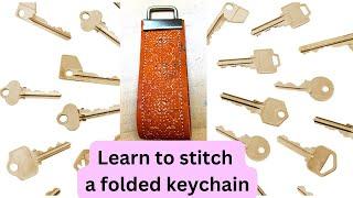 Crafting Magic with Needle and Thread: Watch the Step-by-Step Folded Keychain Stitching Tutorial