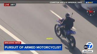 Police chase possible armed suspect near Watts