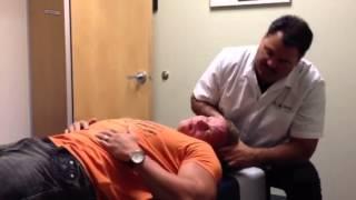 Chiropractor Dr. Matt Rivera adjusting Swedish bodybuilder