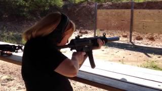 Mom shooting the HK MP5