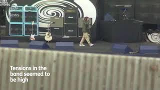 Liam having a bit of an argument with Noel during the Loch Lomond soundcheck in 1996