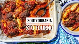 Soutzoukakia Sto Fourno - Greek spiced meatballs baked in an aromatic tomato sauce with potatoes.