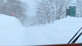 bus ride from Niseko village ski resort to Grand Hirafu ski resort Welcome Center bus stand Dec 2021