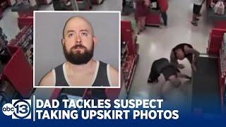 Dad tackles man suspected of taking upskirt photos of daughter