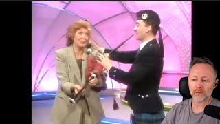 Cilla plays the bagpipes