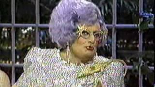 Dame Edna wearing silver dress (part 2) on Joan Rivers talk show