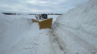 Motor grader South Dakota Blizzard plowing