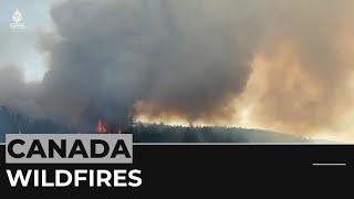 Wildfires prompt hazy skies, air quality warnings in Canada, US