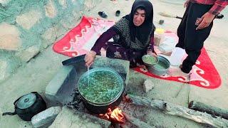 Making nomadic soup with the local cooking method