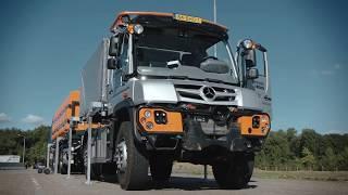 Unimog U 430 implement carrier with trailer for demountable bodies.