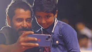 beautiful moment of chiyaan Vikram with a kid