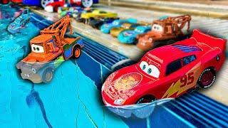 Disney Pixar Cars fall into the water: Lightning McQueen,Doc Hudson,Chick Hicks,Mater,Sally Carrera